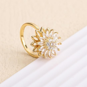 SolFlair – Anillo Girasol Giratorio con Circonias