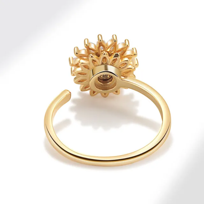 SolFlair – Anillo Girasol Giratorio con Circonias
